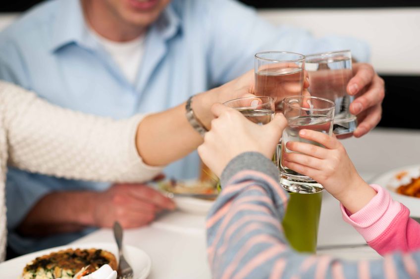 Cheers with water glasses