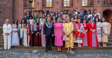 Group photo of 2025 Stockholm Junior Water Prize finalists outside Stockholm City Hall
