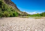 Cracked, dry riverbed illustrating severe drought and water scarcity across the United States