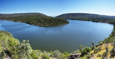 Meander of the Tagus River surrounded by green hills in central Spain.