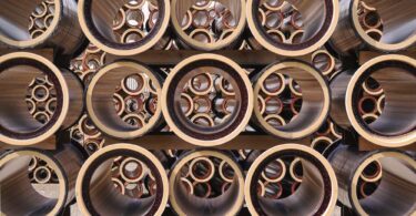 Stacked vitrified clay pipes ready for installation, demonstrating the durability and smooth internal finish of Steinzeug-Keramo’s products.