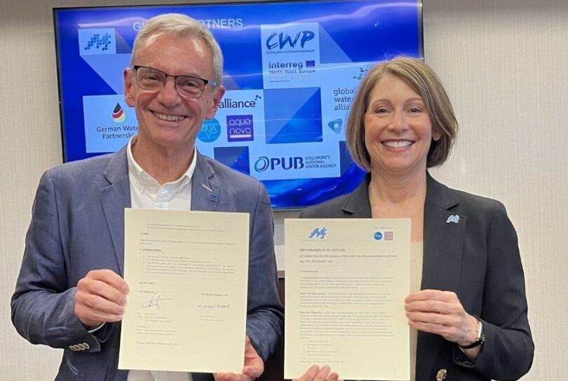 The Water Council Executive Director Karen Frost and Eric Servat sign a memorandum of action strengthening collaboration between water technology clusters in the U.S. and France.