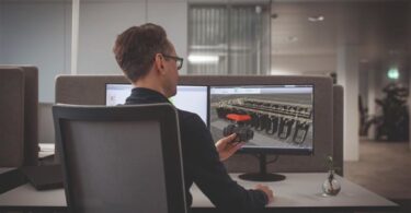 Engineer designing a liquid cooling flow system using GF’s LiquidCore Engineered Flow Solution