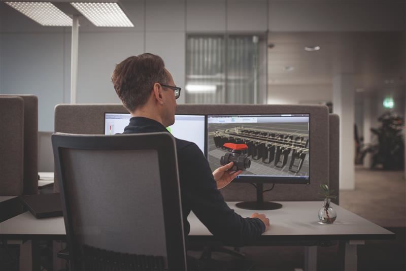 Engineer designing a liquid cooling flow system using GF&rsquo;s LiquidCore Engineered Flow Solution