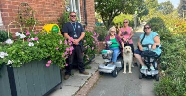 Residents and partners at Bucklers View with sustainable drainage planters installed by Sudsplanter and Southern Water