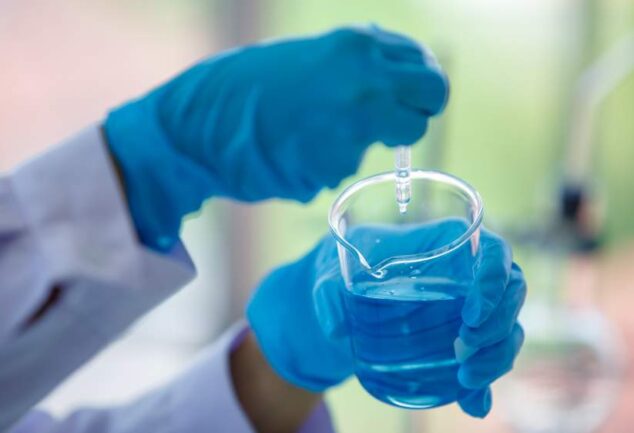 Laboratory water sample being prepared for chemical analysis
