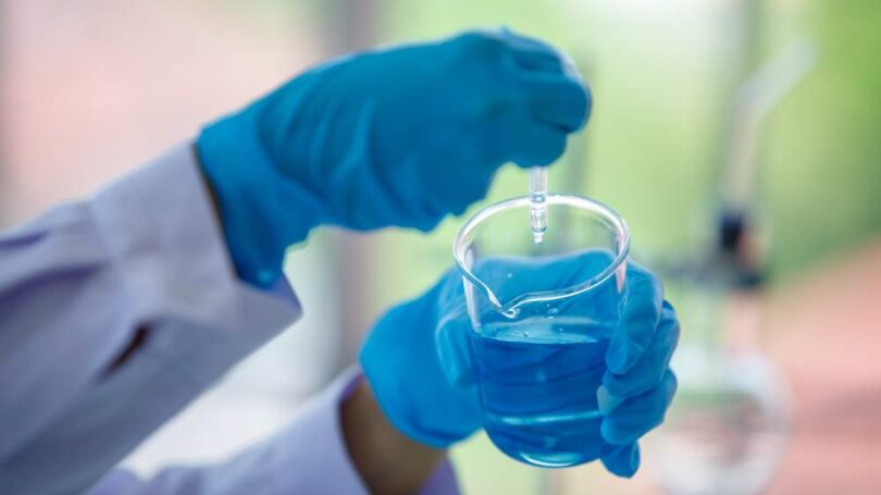 Laboratory water sample being prepared for chemical analysis