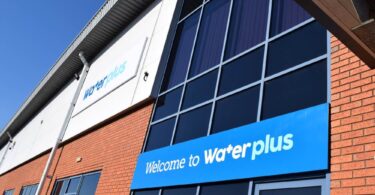 Water Plus headquarters building highlighting the company’s Net Zero and sustainability commitment