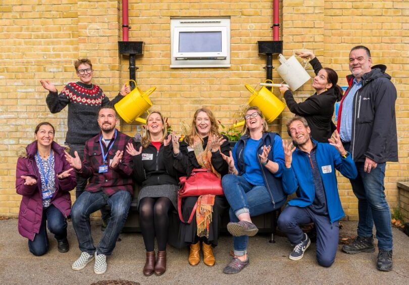 Pupils, staff and partners celebrating new SuDS planters at New Hinksey CE Primary School, Oxford