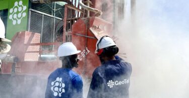 Engineers operating geothermal drilling equipment for water treatment project in Nigeria