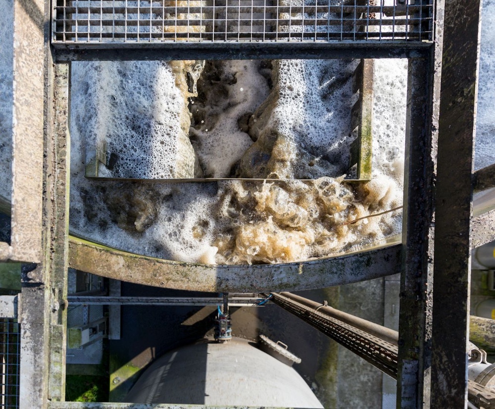 Wastewater treatment aeration and filter backwashing using low-pressure air systems