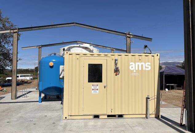 Containerised advanced water treatment system for on-site contaminant removal