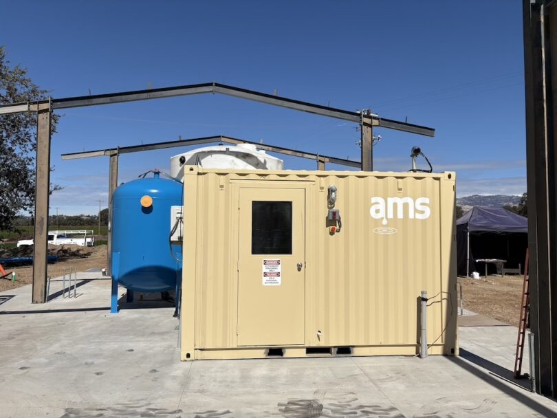 Containerised advanced water treatment system for on-site contaminant removal