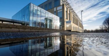 UK water retailer sustainability performance reflected in modern corporate headquarters building