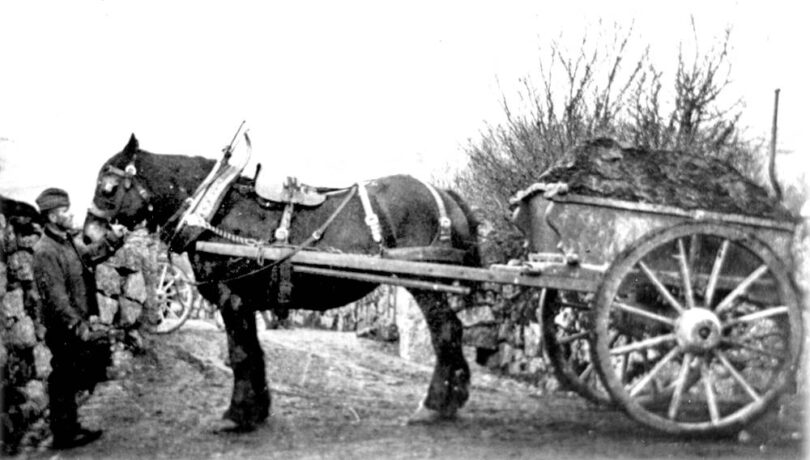 Historic peat cutting linked to Dartmoor peatland restoration showing horse-drawn cart transporting peat on Dartmoor