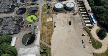 Rugby sewage treatment works upgrade showing activated sludge tanks and construction works to increase capacity