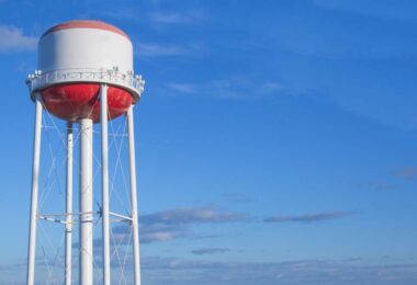 US water infrastructure funding earmarks municipal water tower infrastructure against blue sky
