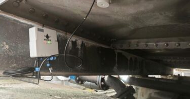 smart water tank monitoring technology non invasive sensor installed beneath water storage tank