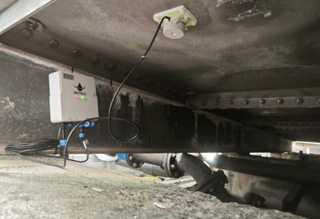 smart water tank monitoring technology non invasive sensor installed beneath water storage tank