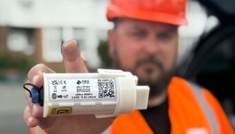 SES Water smart meter retrofit technology Jellyfish device installation engineer