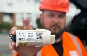 SES Water smart meter retrofit technology Jellyfish device installation engineer