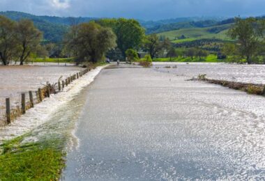 AI flood risk management flooding road overtopped by water during heavy rainfall