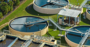 Wastewater treatment plant infrastructure illustrating asset management and monitoring challenges across water systems.