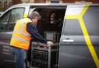 Engineer using Ovarro telemetry equipment in a service van for remote water infrastructure monitoring