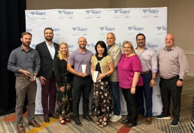 PCL Phoenix water treatment project award team group photo at Arizona Water Association event