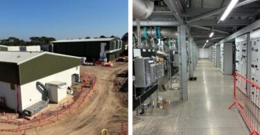 Industrial water treatment facility interior showing pipework and control panels in a modern water treatment plant