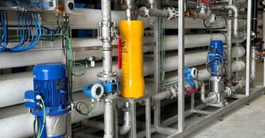 Reverse osmosis membrane racks at a large-scale seawater desalination plant, illustrating the technology behind the Harbor Island Desalination Facility in South Texas