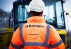 Barhale construction worker wearing high-visibility PPE at a water infrastructure project site.