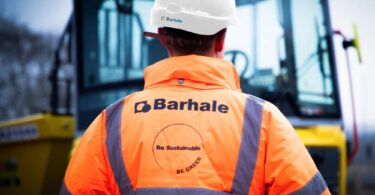 Barhale construction worker wearing high-visibility PPE at a water infrastructure project site.