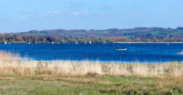 Chew Valley Lake, a Bristol Water reservoir, with open water under summer skies