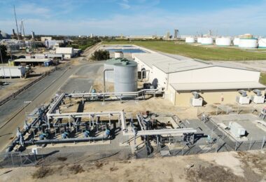 Aerial view of the Kwinana Water Reclamation Plant in Western Australia, showing treatment tanks and pipework within the Kwinana industrial area