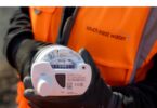 South East Water worker holding an Itron smart water meter during the company's meter upgrade programme