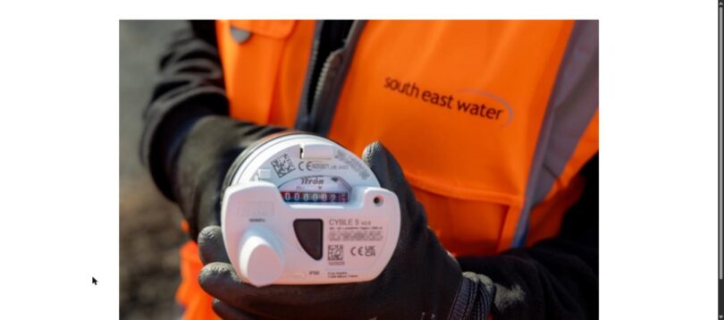 South East Water worker holding an Itron smart water meter during the company's meter upgrade programme