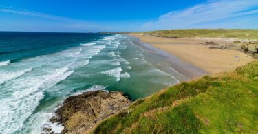 Sandy beach and surf on the South West coast of England within Pennon's water service region