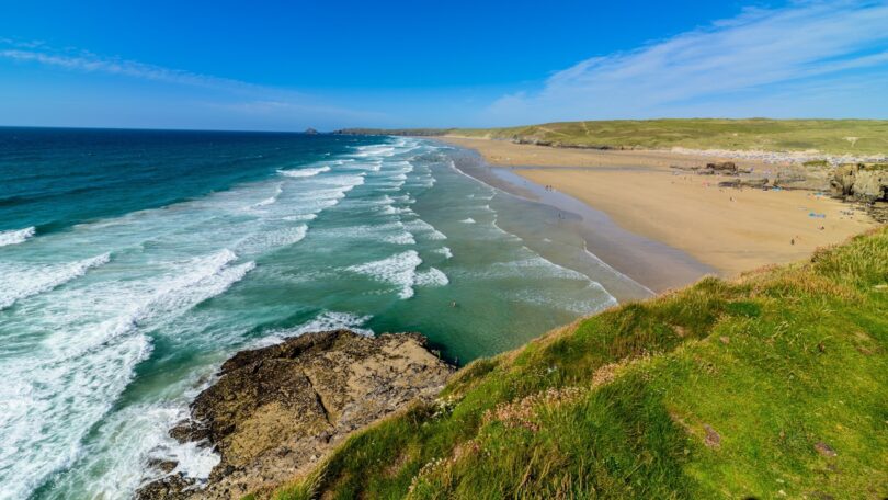 Sandy beach and surf on the South West coast of England within Pennon's water service region