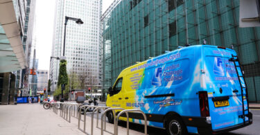 Drainage services vehicle operating in a commercial district as businesses face growing pressure from ageing sewer infrastructure.