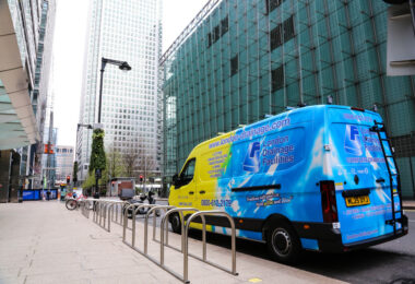 Drainage services vehicle operating in a commercial district as businesses face growing pressure from ageing sewer infrastructure.