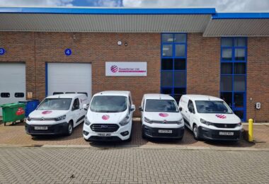 Sweetbriar branded service vehicles outside the company&rsquo;s premises in Hampshire