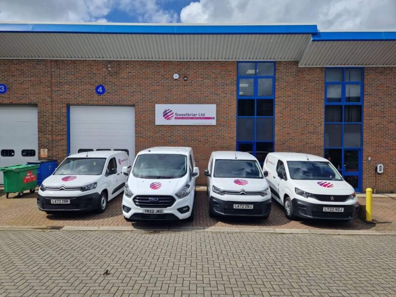 Sweetbriar branded service vehicles outside the company&rsquo;s premises in Hampshire