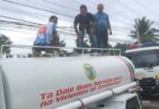 City Water District staff on a water tanker during water supply operations