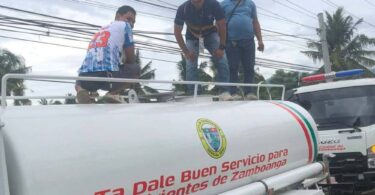 City Water District staff on a water tanker during water supply operations