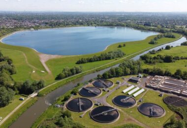 Aerial view of Esher Sewage Treatment Works and reservoir in the Thames Water region