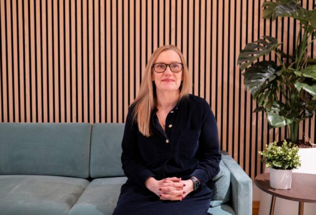 Lucy Darch, CEO of Wave, seated in an office setting