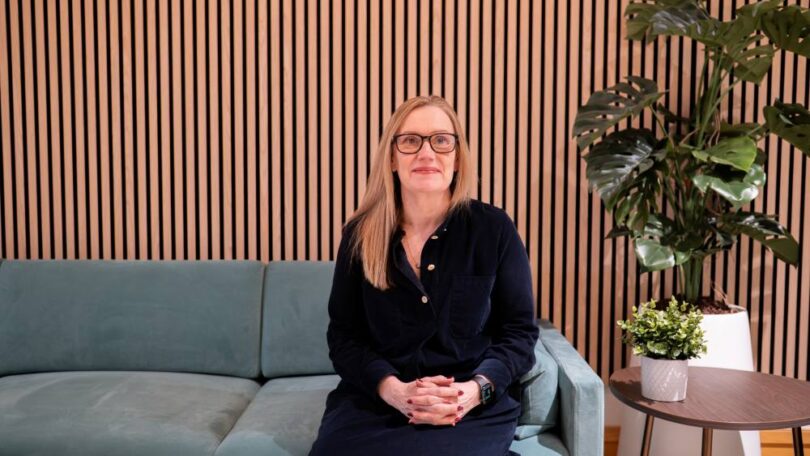 Lucy Darch, CEO of Wave, seated in an office setting