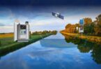 Schematic of a wireless transit-time river flow monitoring system using sensors and satellite communication
