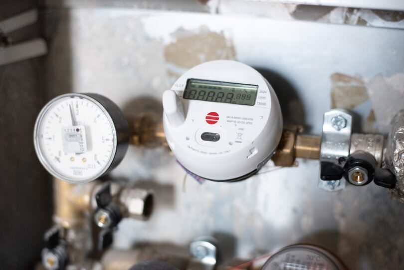 Digital water meter installed in a utility system
